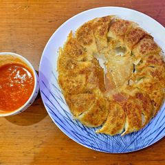 A picture of Kuotie - Chinese Indonesian pan fried dumplings.