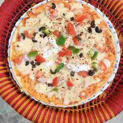 Cheesy pan pizza A picture of Cheesy pan pizza.