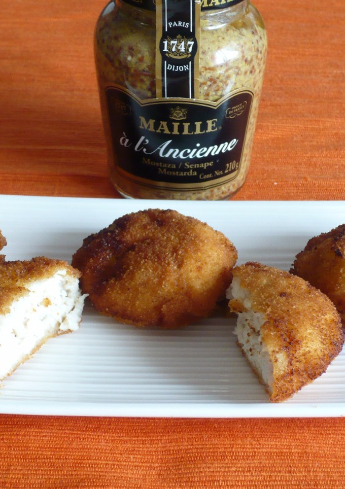 Una foto de Nuggets de pollo y queso