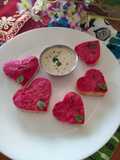 Heart shaped fried beetroot idli
