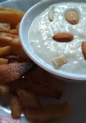 A picture of Samak ki kheer with fried aaloo.