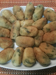 Una foto de Croquetas de queso y espinacas