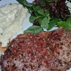 Pan Fried Porterhouse Steak w/ Garlic Butter and Rosemary A picture of Pan Fried Porterhouse Steak w/ Garlic Butter and Rosemary.