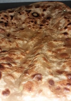 A picture of Paratha with Leftover Salan.