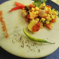 A picture of Corn masala chat.