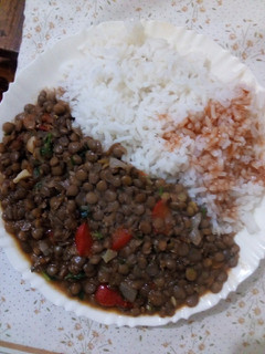A picture of Lentils and rice.