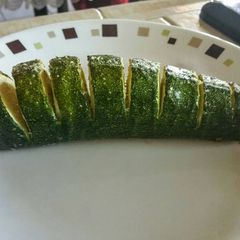 A picture of Parmesan stuffed baked Zucchini.
