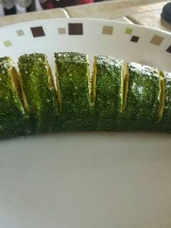 A picture of Parmesan stuffed baked Zucchini.
