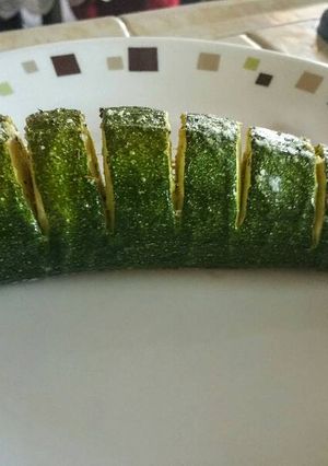 A picture of Parmesan stuffed baked Zucchini.