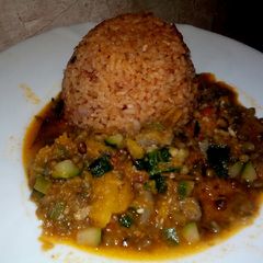 A picture of Pilau with mixed vegetable stew.