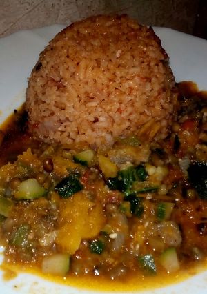 A picture of Pilau with mixed vegetable stew.