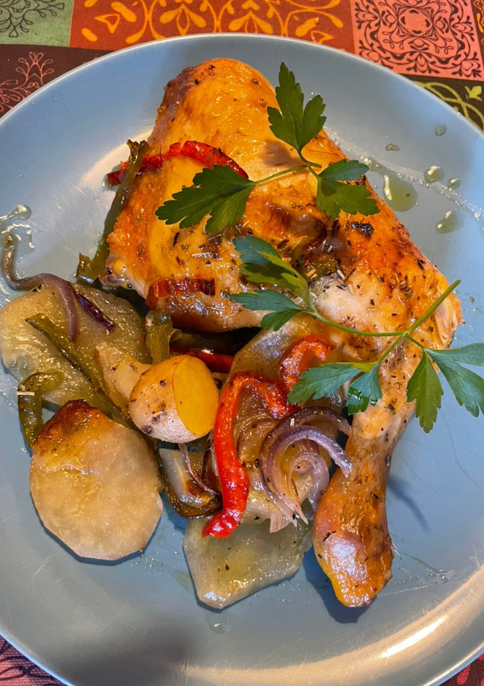Una foto de Cuartos de pollo al horno