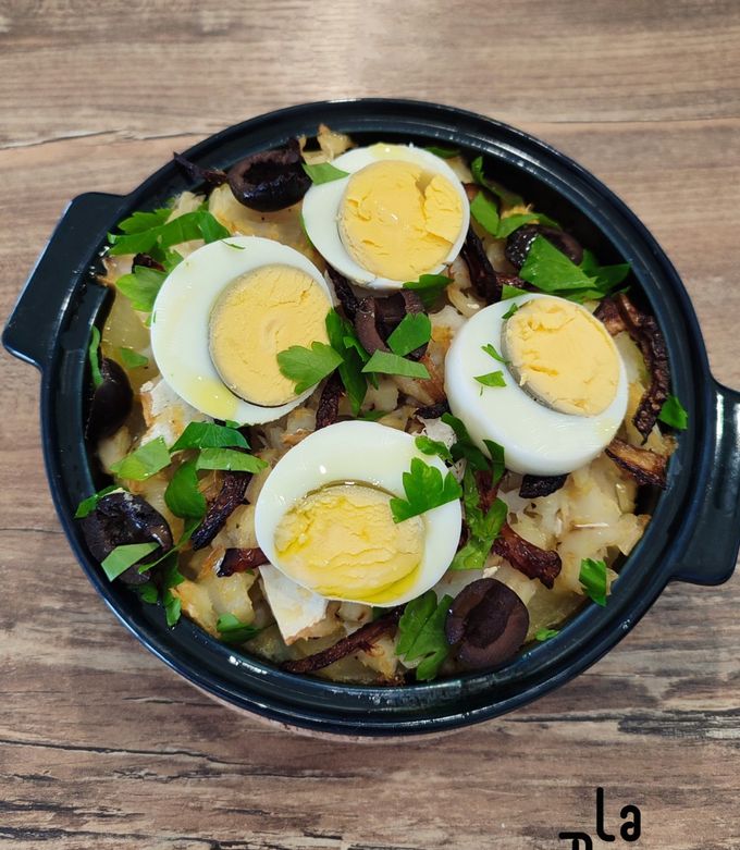 Une photo de Bacalhau a Gomes de Sa