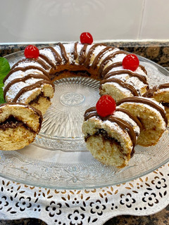 Una foto de Bizcocho esponjoso con ricotta y relleno de Nutella