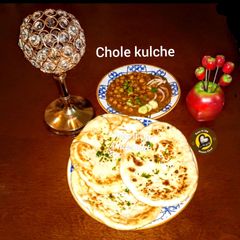 A picture of Spicy Chole And Kulche.