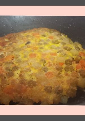 Una foto de Tortilla con Una lata de jardinera