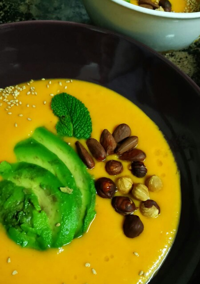 Una foto de Crema templada de calabaza, zanahoria y jengibre