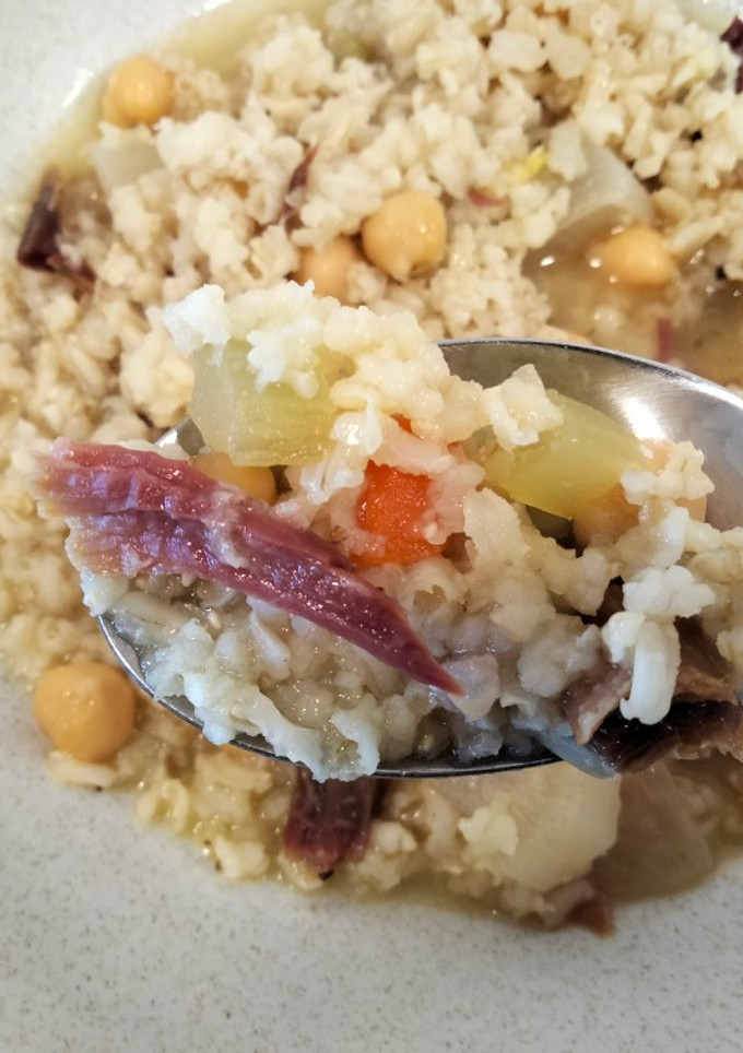 Una foto de Arroz caldoso paletilla