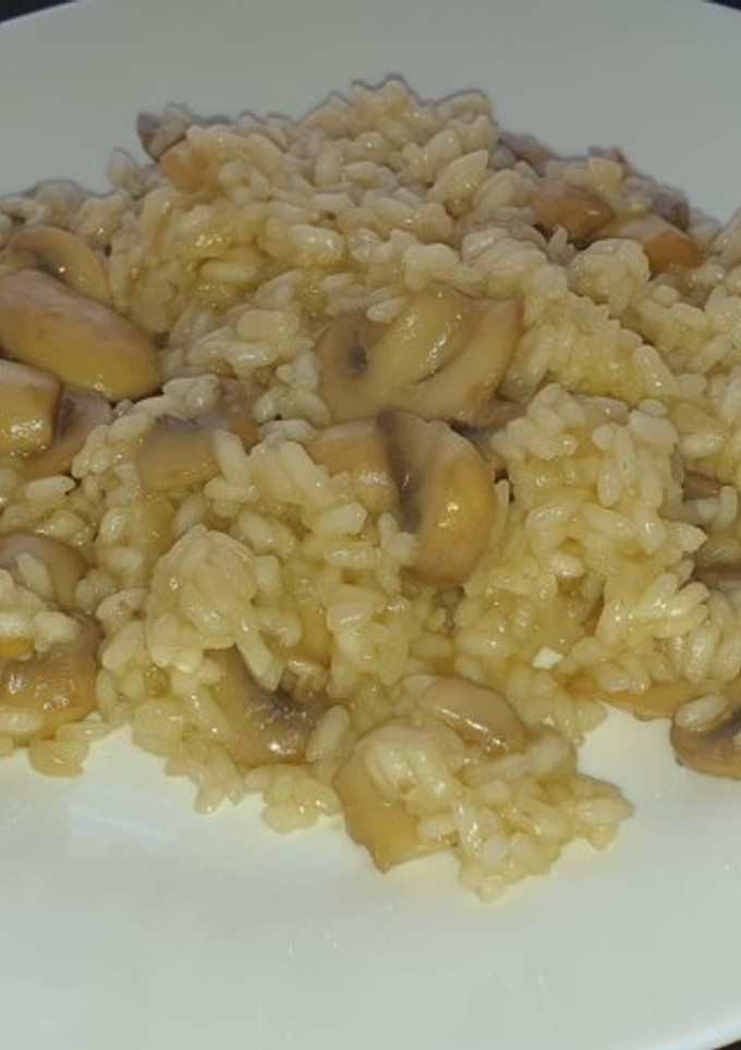 Una foto de 🗣✅Risotto de champiñones🍄