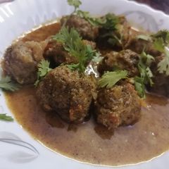 A picture of Beef kofta curry (meat balls).