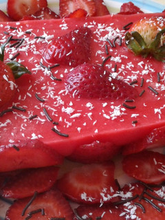 Una foto de Flan de frutilla