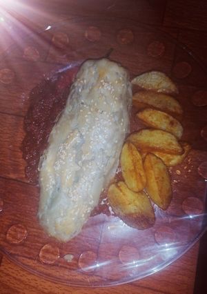 Una foto de Rollo de chile poblano hojaldrado