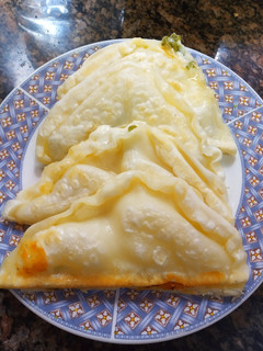 Una foto de Empanadas express de muzzarella y verdeo en sandwichera
