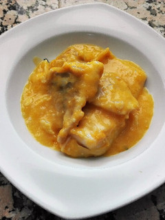 Una foto de Bacalao en salsa de naranja