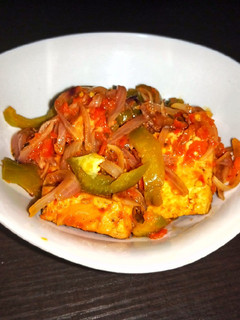 A picture of Tofu in sauce.