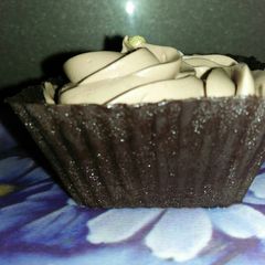 A picture of Chocolate mousse in chocolate cups.