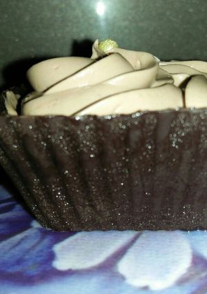 A picture of Chocolate mousse in chocolate cups.