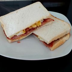 A picture of My Simple Bacon + Egg Sandwich #2Flavours #Breakfast.