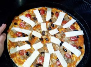 صورة لوصفة بيتزا بالطماطم الكرزية Pizza tomate cerise