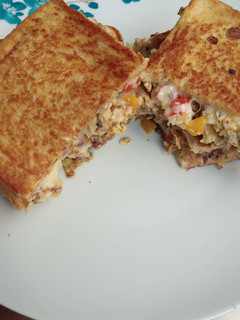 A picture of Toasted bread with omelette.