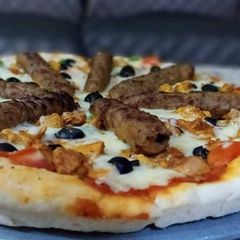 A picture of Spicy Chicken & Seekh Kabab Pizza authentic recipe.