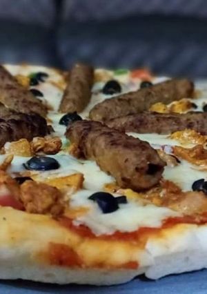 A picture of Spicy Chicken & Seekh Kabab Pizza authentic recipe.