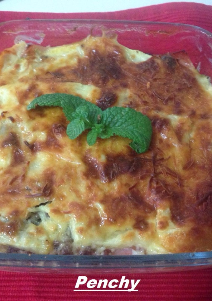 Una foto de Pastel de morcilla y calabacín gratinado