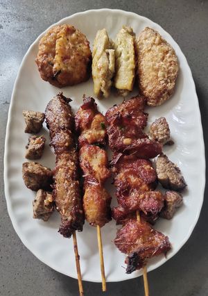 A picture of Pork and Chicken Skewers.