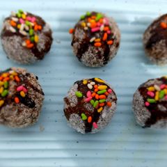 A picture of Hershey's and cocoa bread balls.