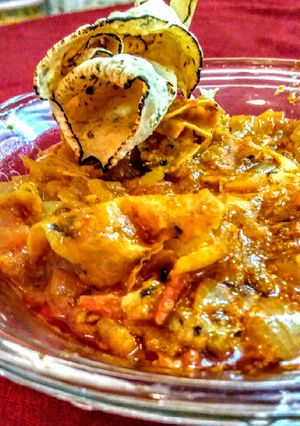 A picture of Rajathani papad ki sabji (onion, tomato curry).