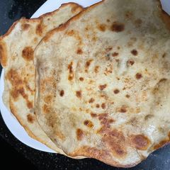 A picture of Naan Bread - Sooooooo Perfect.