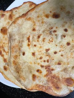 A picture of Naan Bread - Sooooooo Perfect.