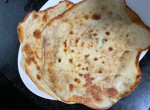 A picture of Naan Bread - Sooooooo Perfect.