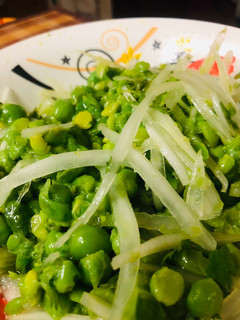Una foto de Ensalada de Arvejas con cebolla y cilantro