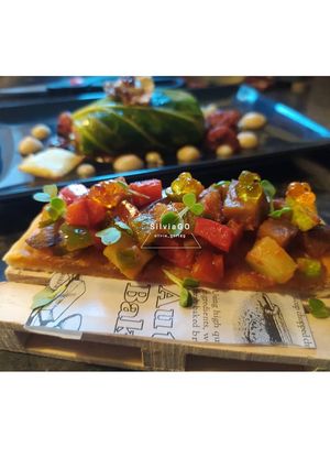Una foto de Coca mallorquina de pisto manchego