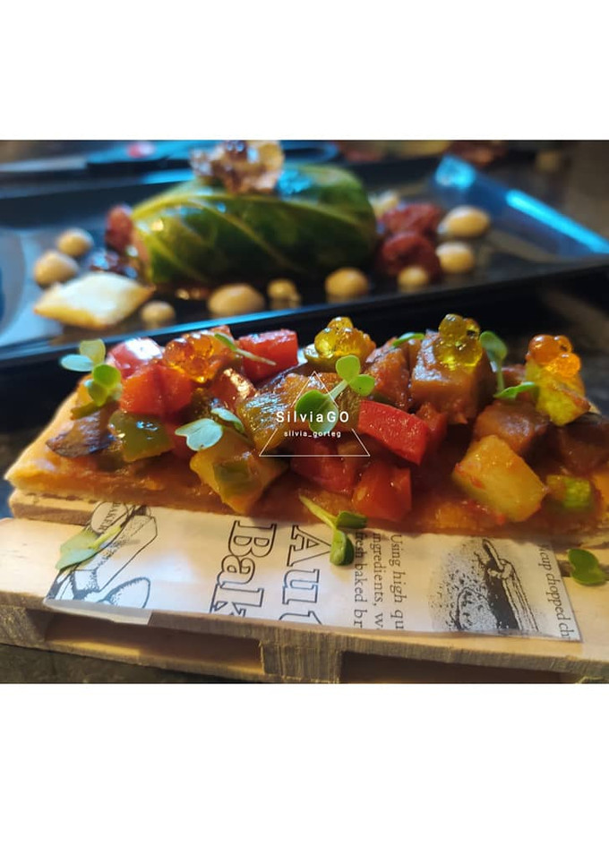 Una foto de Coca mallorquina de pisto manchego