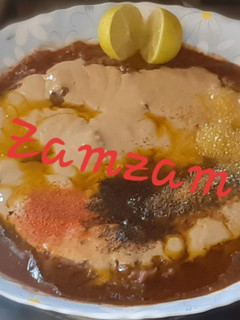 صورة لوصفة فول مدمس منزلي بالزيت الحار والطحينة 😋