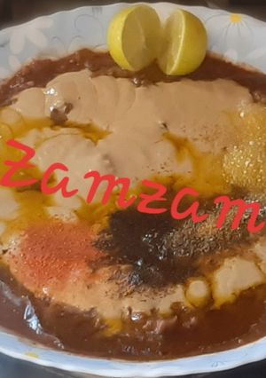 صورة لوصفة فول مدمس منزلي بالزيت الحار والطحينة 😋