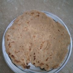 A picture of Cheeni paratha.