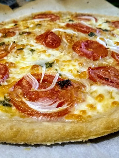 Una foto de Pizza con masa madre